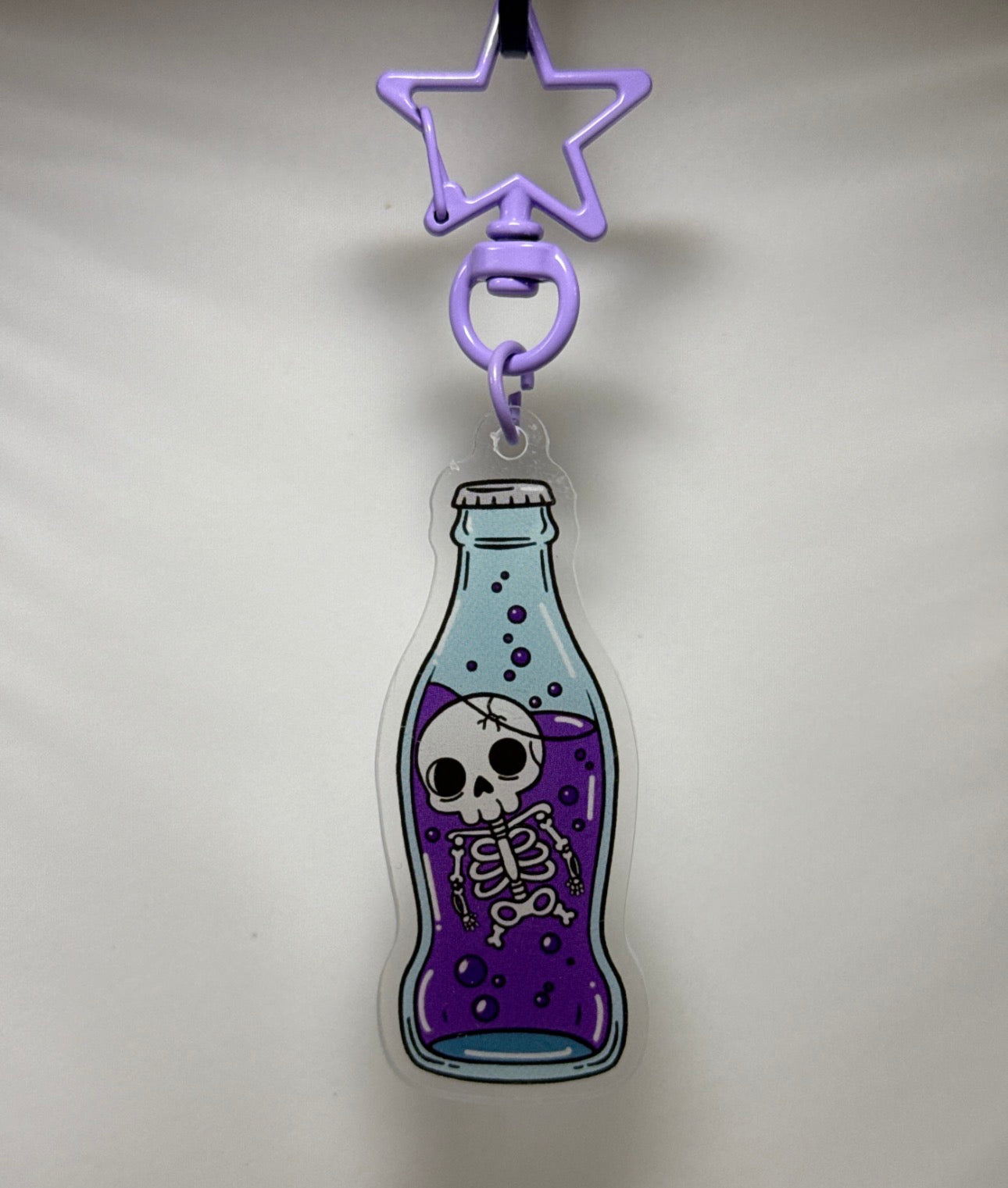Mr. Skelly Soda Keychain